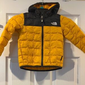 The North Face Black and Yellow Hooded Jacket